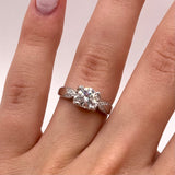 Luminous Majesty Moissanite Ring - Radiant Center Stone in a Sleek Metal Band
