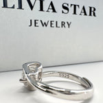 Refined Moissanite Engagement Ring - Love-Inspired Design with a Brilliant Cut