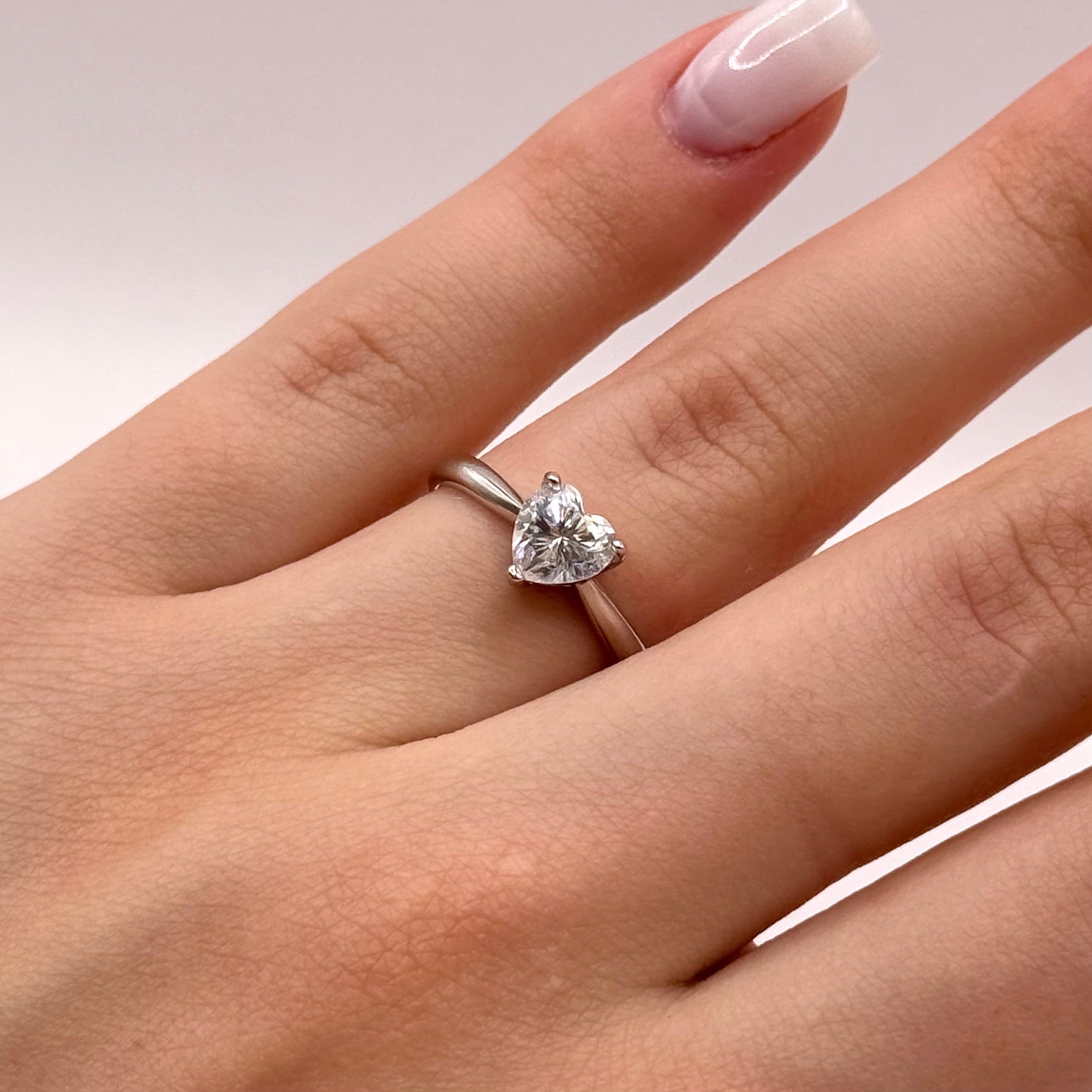 Brilliant Heart Moissanite Ring - Radiant Heart-Shaped Stone in Polished Metal