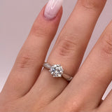 Graceful Moissanite Ring - Sparkling Center Stone in a Sleek Metal Band