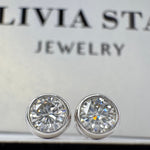 Refined Moissanite Stud Earrings - Precisely Cut Stones in a Modern Setting