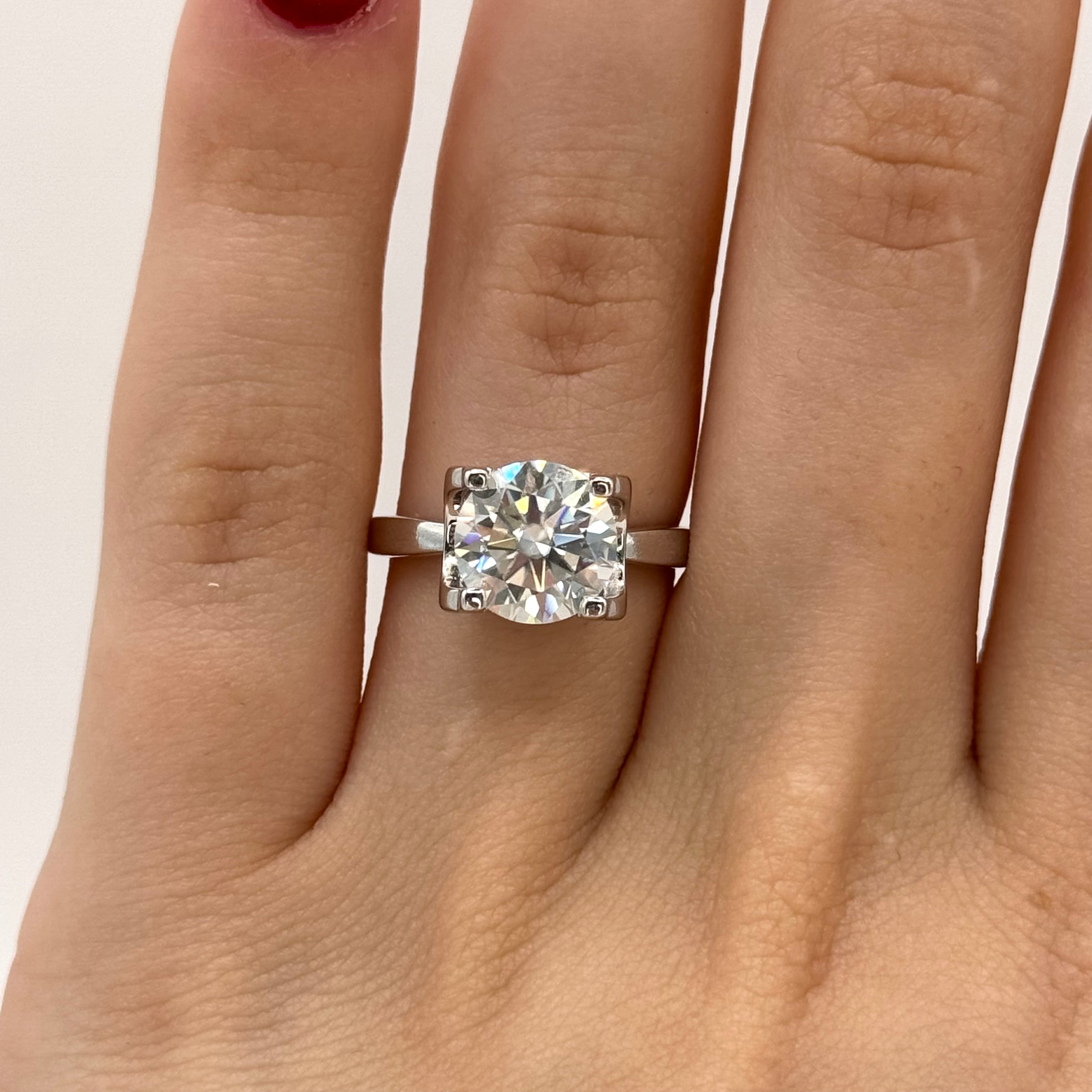 Brilliant Moissanite Ring - Timeless Opulence in a Sleek and Elegant Setting