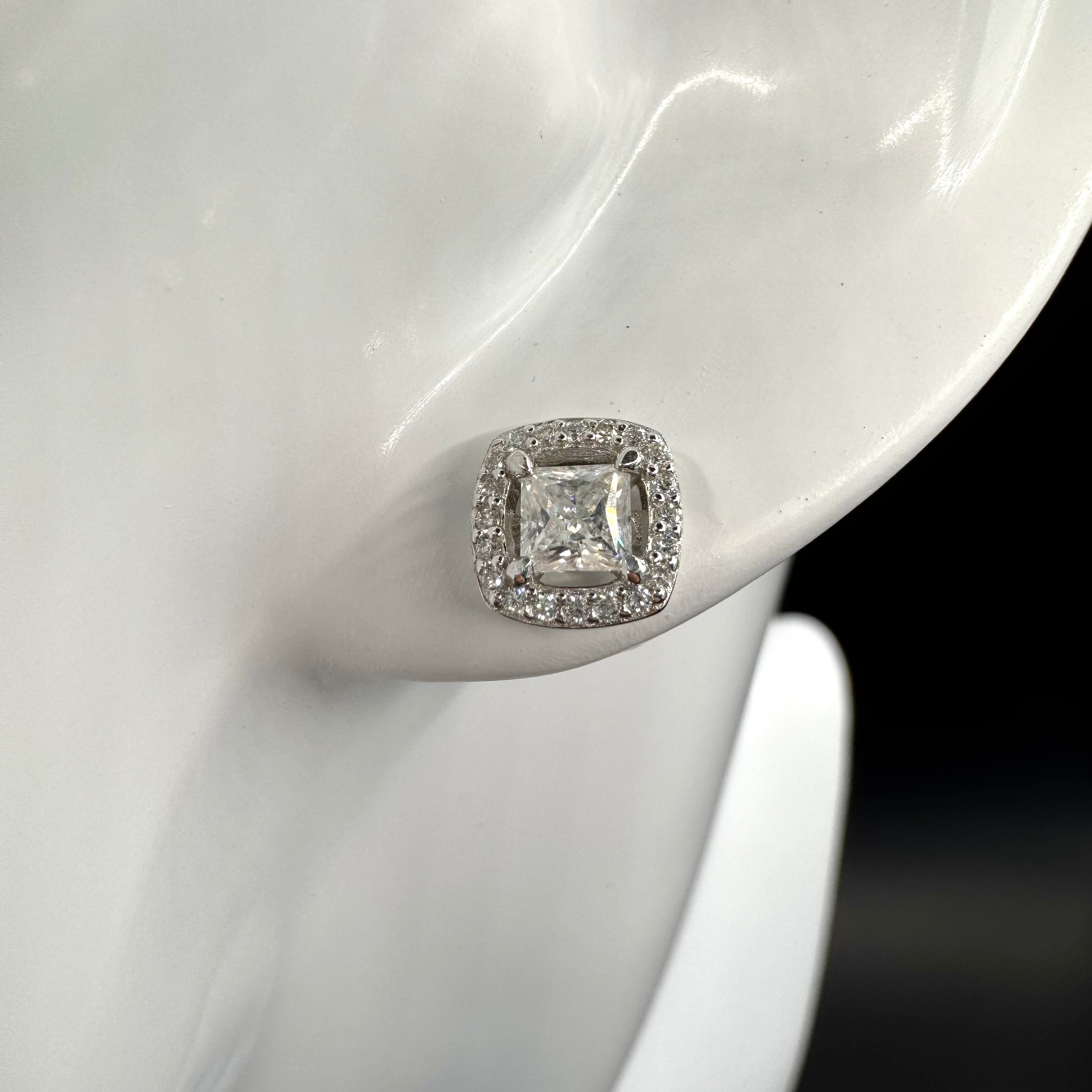 Elegant Moissanite Stud Earrings - Sleek Metal Frame with Brilliant Stones