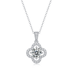 Moissanite pendant necklace with a clover bloom design, featuring sparkling stones arranged in a delicate four-leaf pattern set in a polished metal frame for a timeless and elegant look.