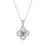 Moissanite pendant necklace with a clover bloom design, featuring sparkling stones arranged in a delicate four-leaf pattern set in a polished metal frame for a timeless and elegant look.