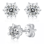 Moissanite stud earrings with a starburst design, featuring radiant stones arranged in a striking pattern set in a polished metal frame for a bold and elegant look.