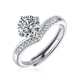 Moissanite engagement ring with a princess design, featuring a brilliant-cut center stone set in a sleek metal band for a sophisticated and timeless look.