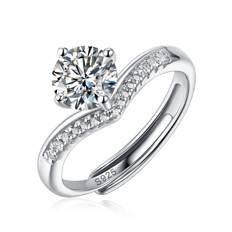 Moissanite engagement ring with a princess design, featuring a brilliant-cut center stone set in a sleek metal band for a sophisticated and timeless look.