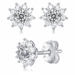 Moissanite stud earrings with a desire-inspired design, featuring brilliant-cut stones set in a sleek metal frame for a refined and radiant look.