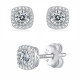 Moissanite stud earrings with a universe-inspired design, featuring dazzling stones set in a sleek metal frame, capturing cosmic elegance and timeless brilliance.