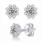 Moissanite stud earrings with a romantic snowflake design, featuring intricately arranged sparkling stones set in a polished metal frame for a delicate and winter-inspired look.