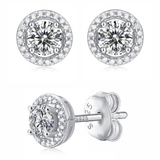 Moissanite stud earrings with a tale-inspired design, featuring radiant stones set in a refined metal frame for a classic and elegant look.