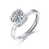 Moissanite engagement ring with a timeless opulence design, featuring a brilliant center stone set in a polished metal band for a sophisticated and luxurious look.