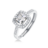 Moissanite engagement ring with a luminous square design, featuring a radiant square-cut center stone set in a sleek metal band for a modern and elegant look.