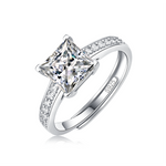 Moissanite engagement ring with a regal reflection design, featuring a brilliant-cut center stone set in a refined metal band for a sophisticated and timeless look.