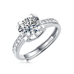 Moissanite engagement ring with an enchanted elegance design, featuring a dazzling center stone set in a polished metal band for a refined and timeless look.