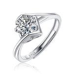 Moissanite engagement ring with a love essence design, featuring a radiant center stone set in a refined metal band for an elegant and timeless look.
