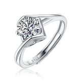Moissanite engagement ring with a love essence design, featuring a radiant center stone set in a refined metal band for an elegant and timeless look.
