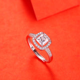 Elegant Moissanite Square Ring - Brilliant Gem in a Contemporary Metal Band