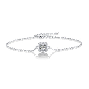 Elegant moissanite bracelet featuring luminous square-cut stones set in a sleek silver-toned metal, designed for a refined and timeless look.