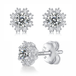 Moissanite stud earrings with a romantic snowflake design, featuring intricately arranged sparkling stones set in a polished metal frame for a delicate and winter-inspired look.