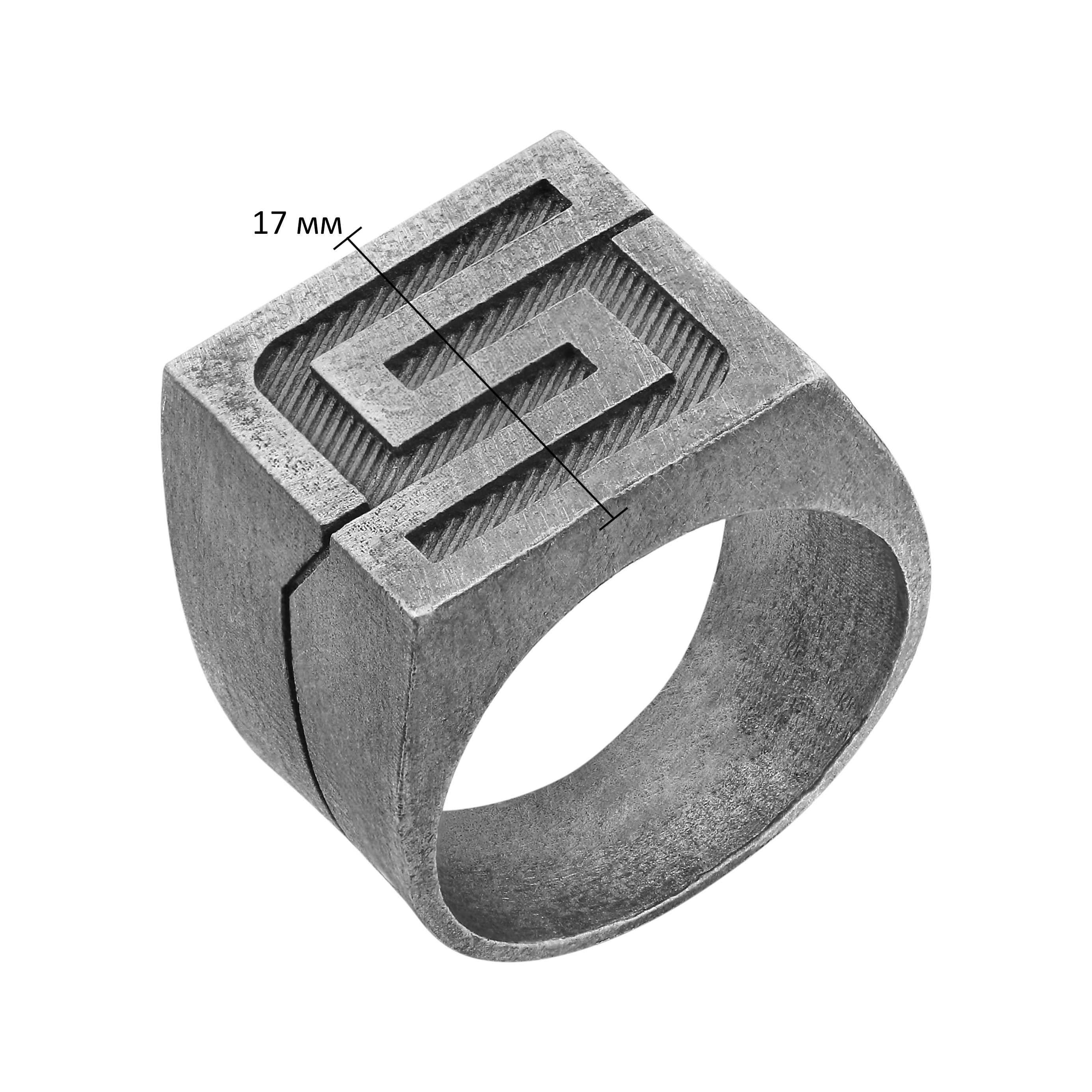 Silver ring with geometric design on a white background