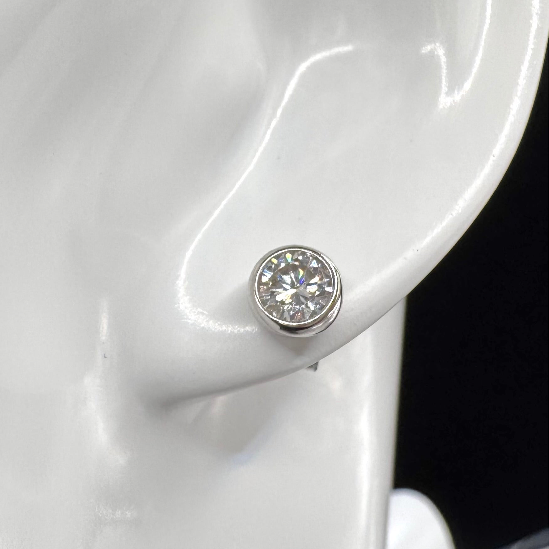 Crystal Symphony Moissanite Stud Earrings - Radiant Stones in a Sleek Metal Frame
