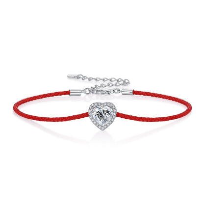 Moissanite bracelet with a heart-shaped charm on an adjustable cord, combining sparkle with a minimalist and modern design for everyday elegance.