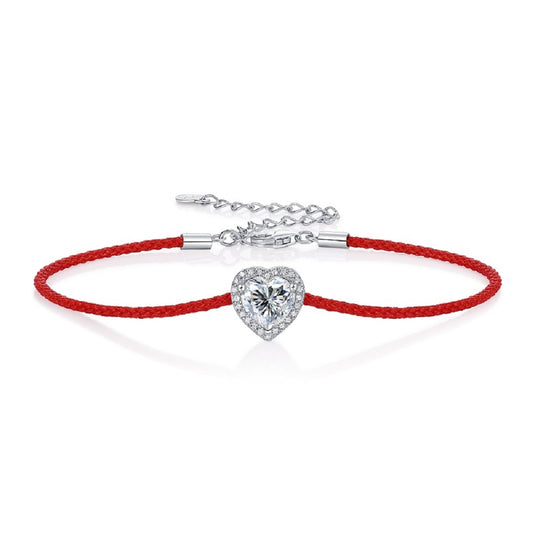 Moissanite bracelet with a heart-shaped charm on an adjustable cord, combining sparkle with a minimalist and modern design for everyday elegance.