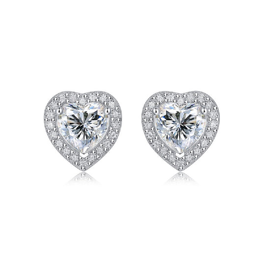Moissanite stud earrings with a heartfelt design, featuring sparkling heart-shaped stones set in a polished metal frame for a timeless and elegant touch.