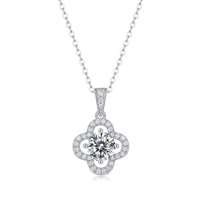 Moissanite pendant necklace with a clover bloom design, featuring sparkling stones arranged in a delicate four-leaf pattern set in a polished metal frame for a timeless and elegant look.
