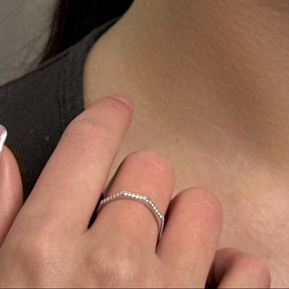 Cubic Zirconia Ring Facet Line Stacker, sterling silver, worn on hand