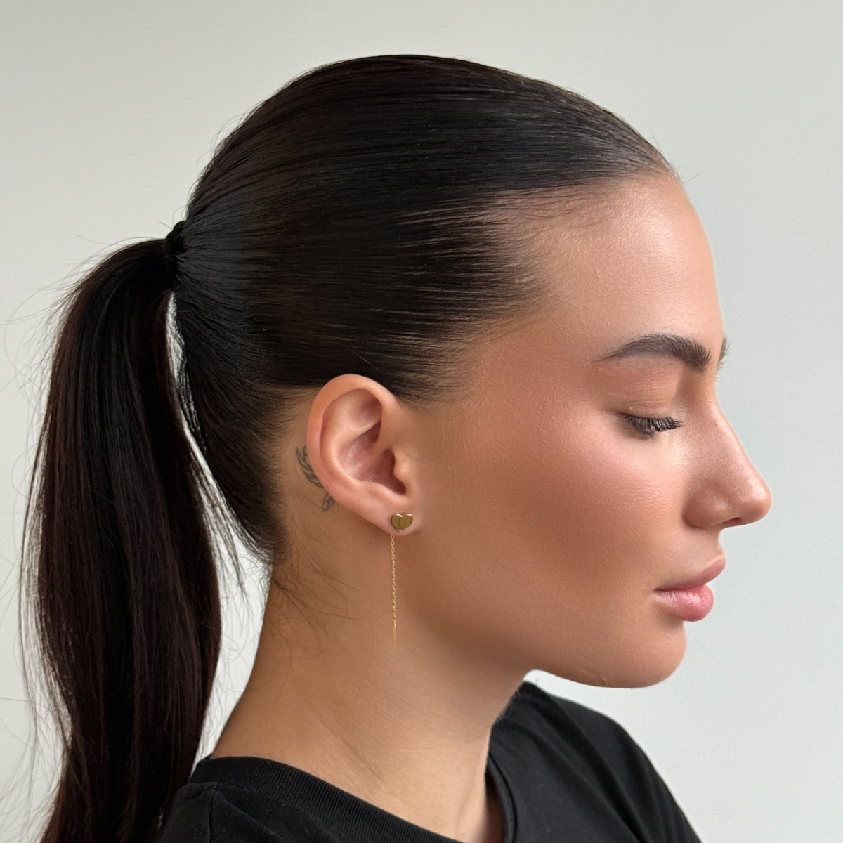 Golden Heart Chain Tail worn on model