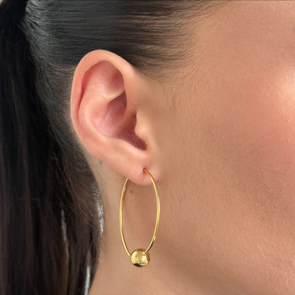 Golden Ball Wire Hoop worn on model