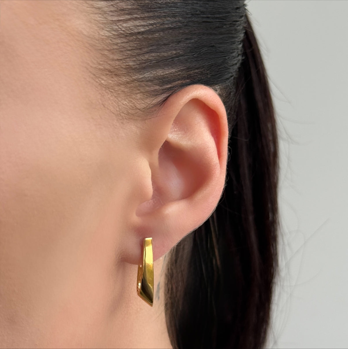 Golden Twisted V worn on model