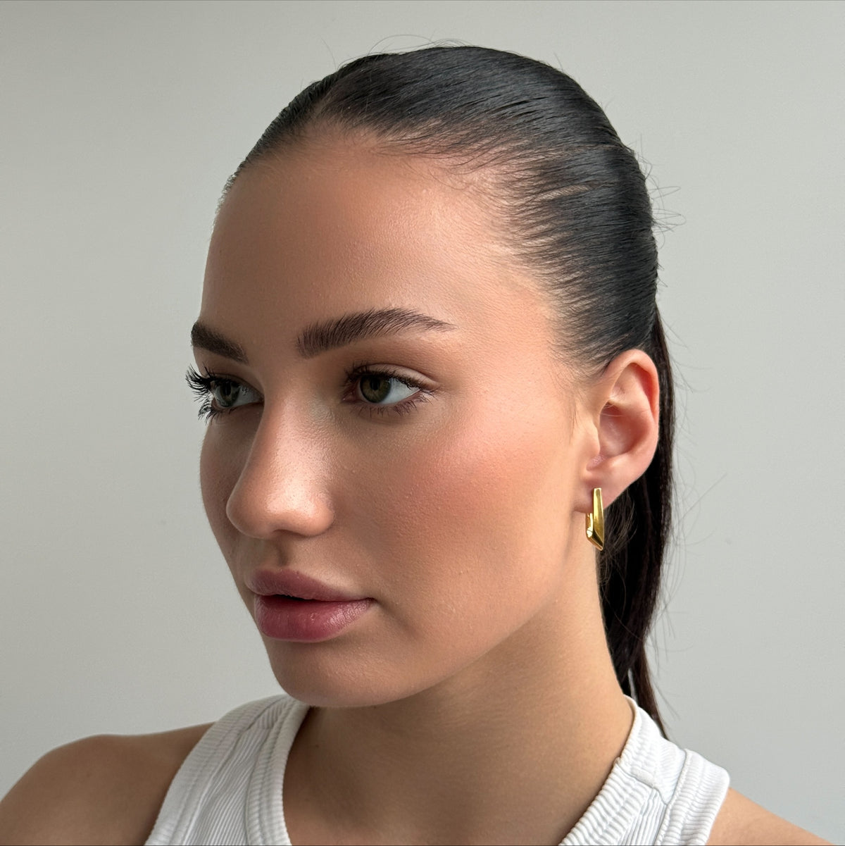 Golden Twisted V worn on model