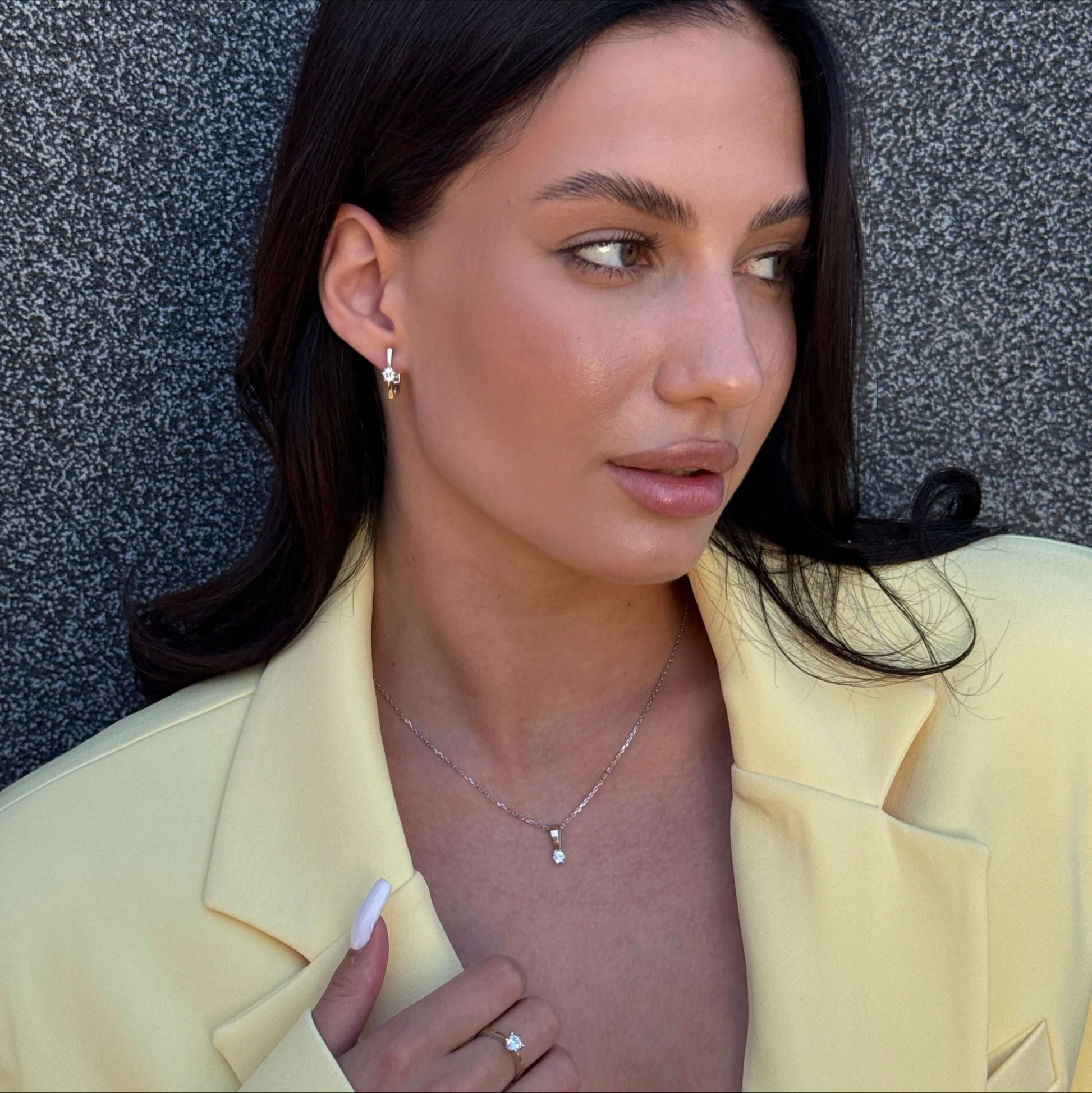 Golden Taper Solitaire worn on model
