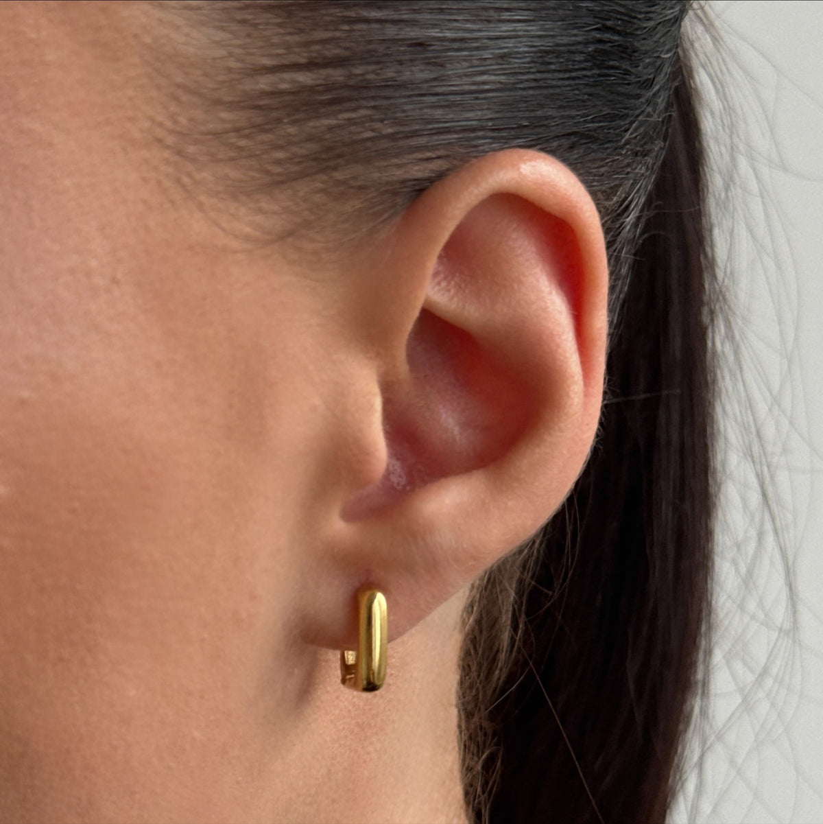 Golden Square Huggie worn on model