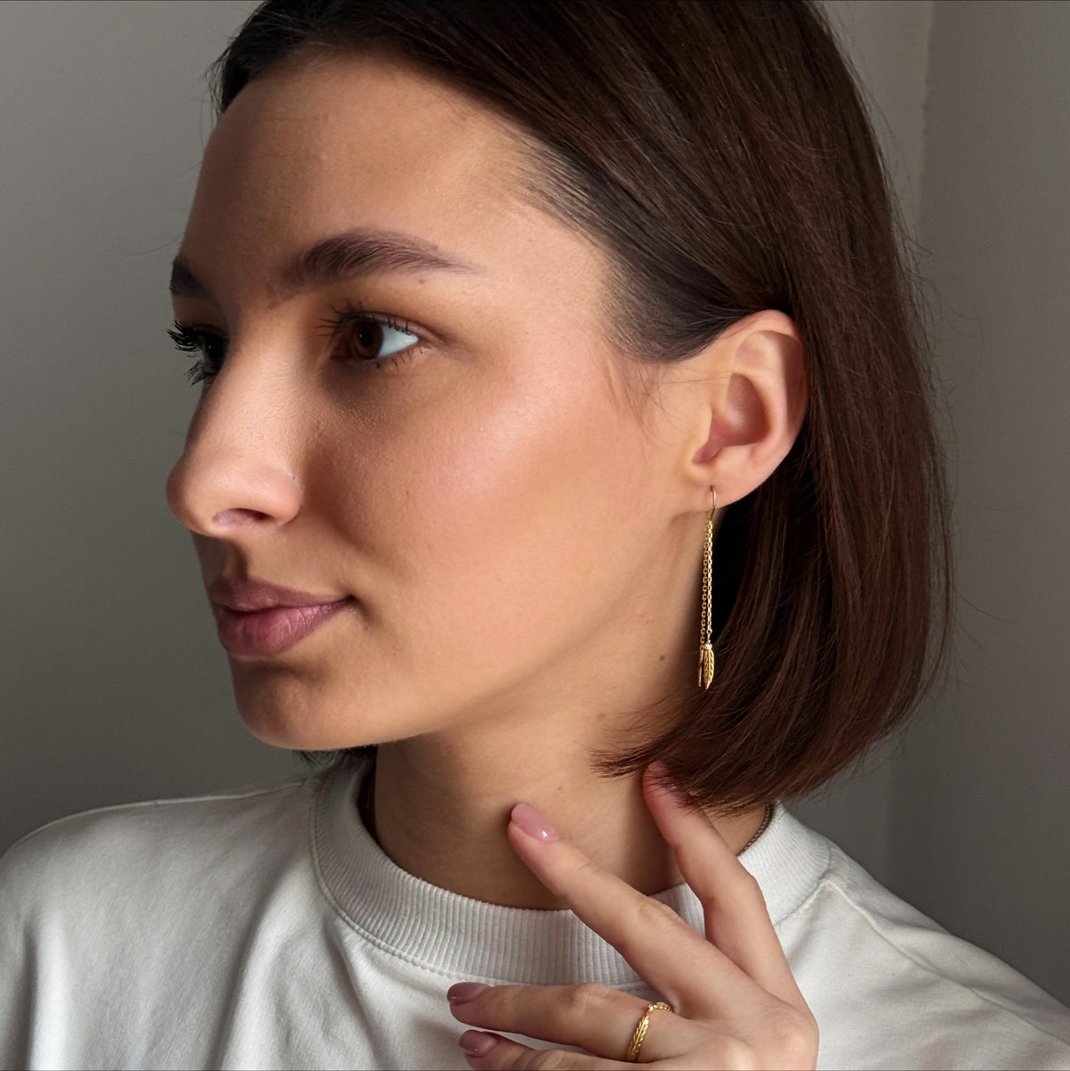 Golden Feather Threader worn on model