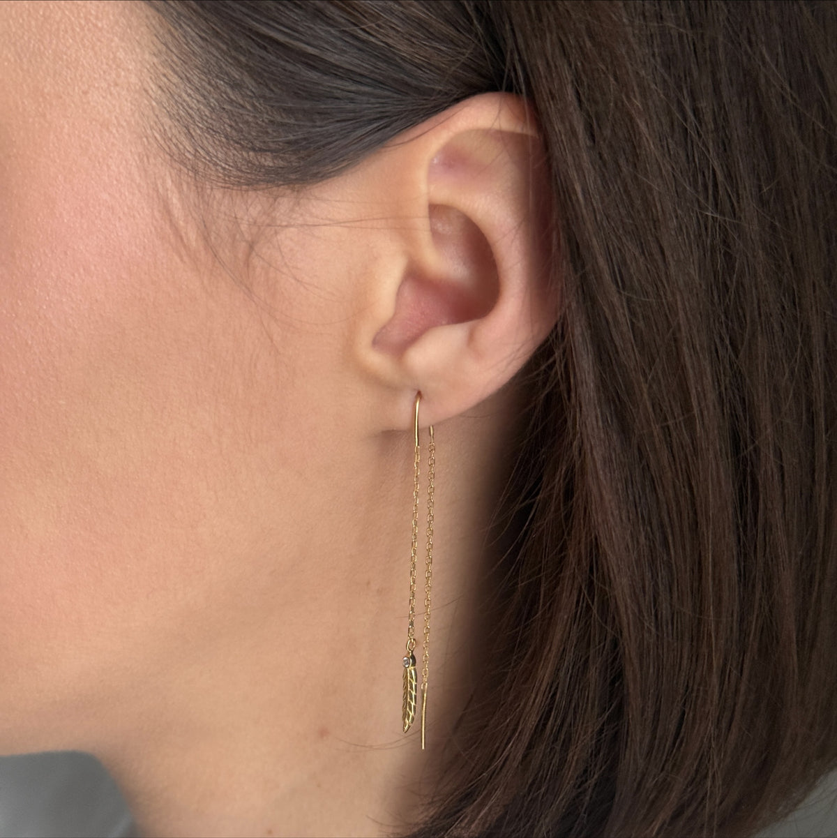 Golden Feather Threader worn on model