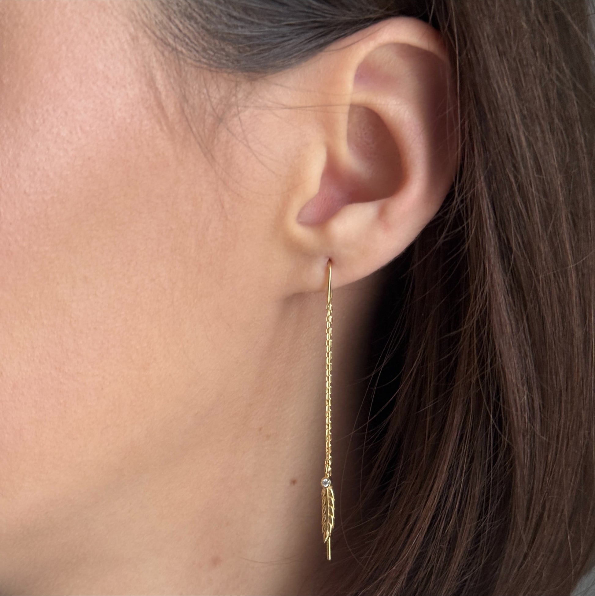 Golden Feather Threader worn on model