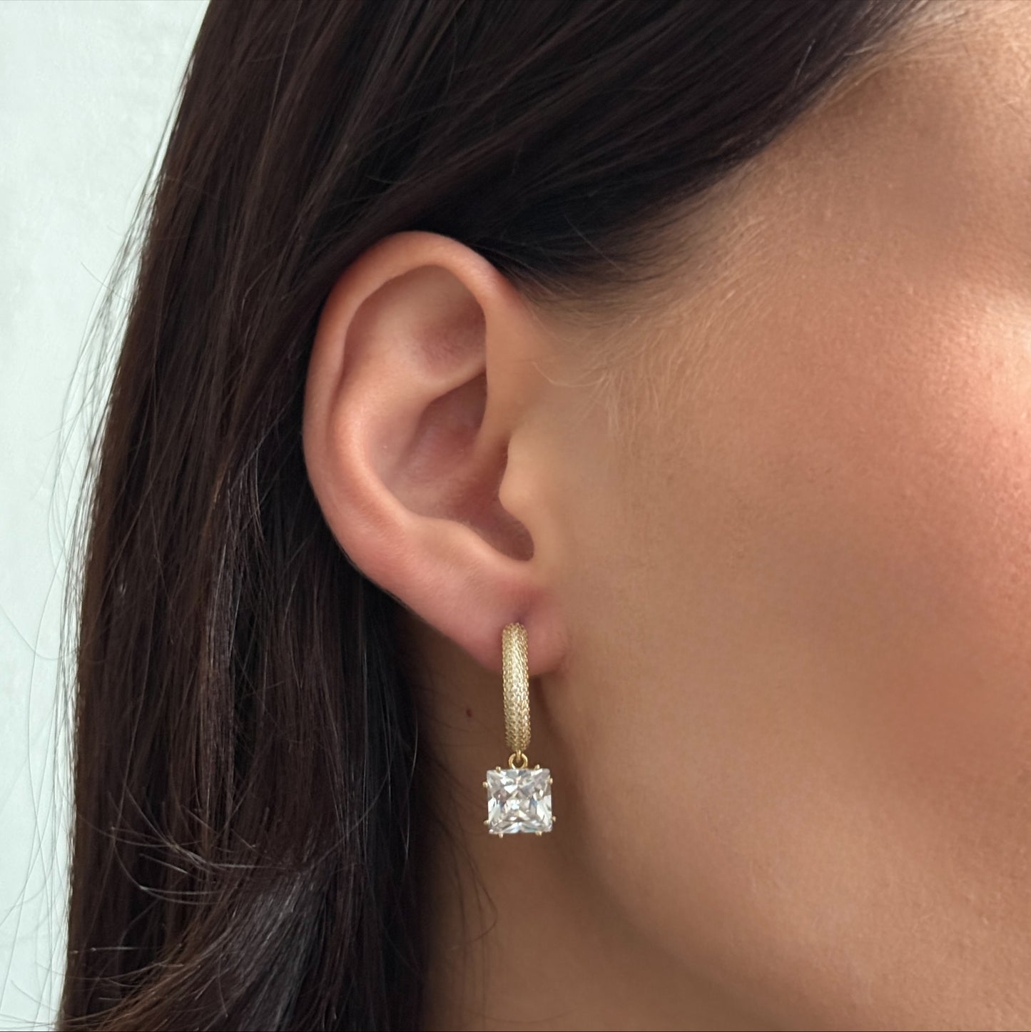 Pavé Huggie Hoops worn on model