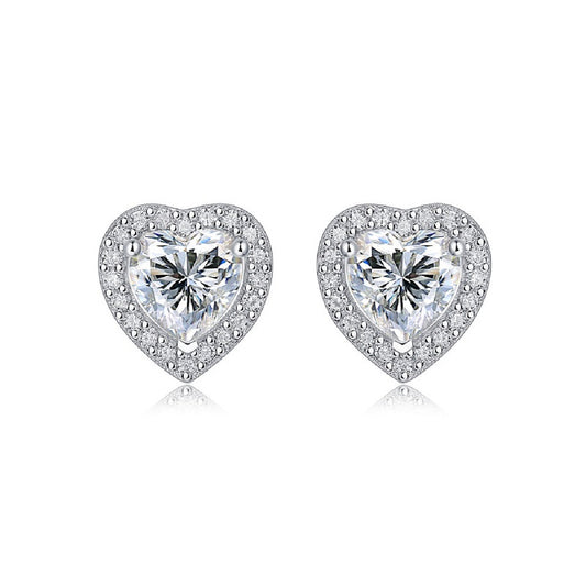 Moissanite stud earrings with a heartfelt design, featuring sparkling heart-shaped stones set in a polished metal frame for a timeless and elegant touch.