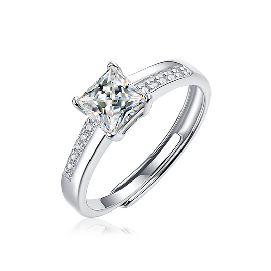 Moissanite ring with a royal radiance design, featuring a brilliant center stone set in a polished metal band for a regal and elegant look.