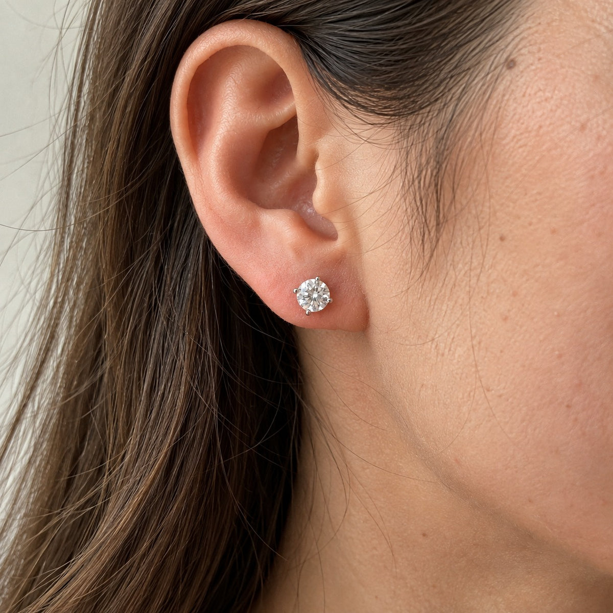 Pure Love moissanite stud earring worn on the ear, true-to-size