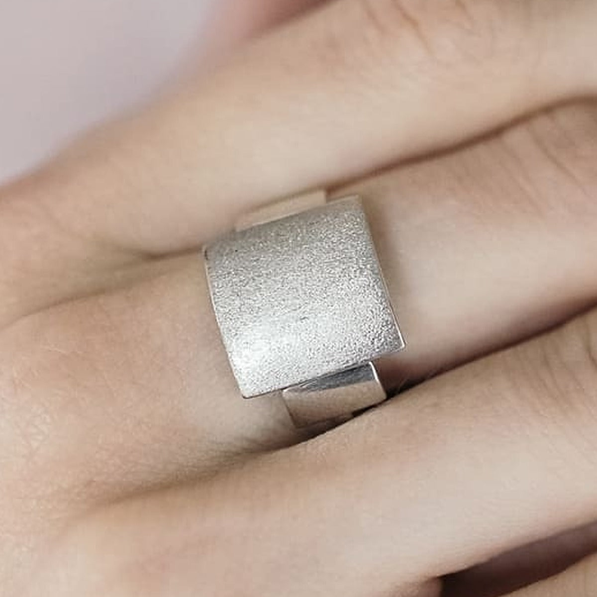 Sterling Silver Ring, brushed plate, worn on hand